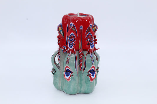 Light mint green and red "classic" carved candle
