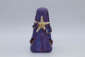 Candele intagliata "mare" viola marmorizzata con venature azzurre