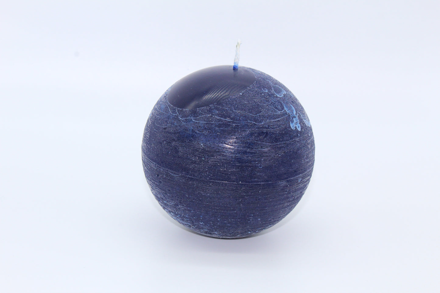 Blue sphere rough effect candle