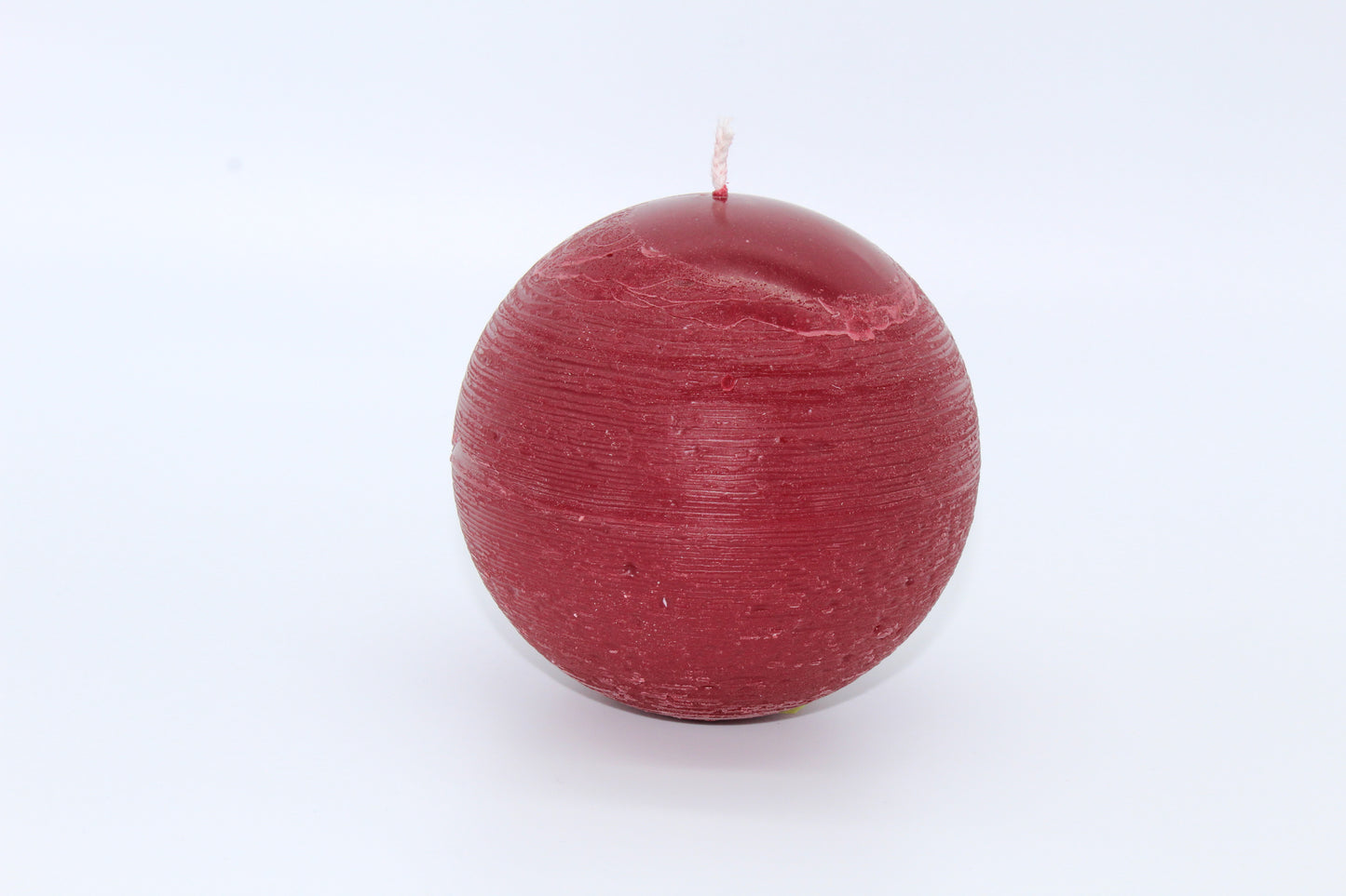 Red sphere rough effect candle