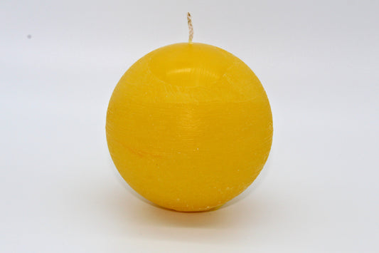Yellow sphere rough effect candle