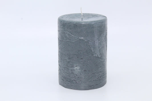 Gray cylindrical raw effect candle