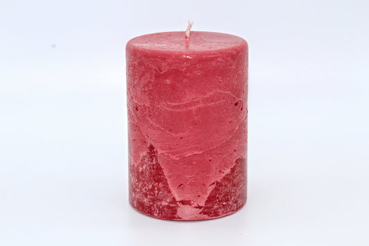 Pink cylindrical raw effect candle