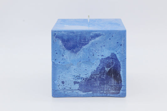 Light blue squared rough effect candle