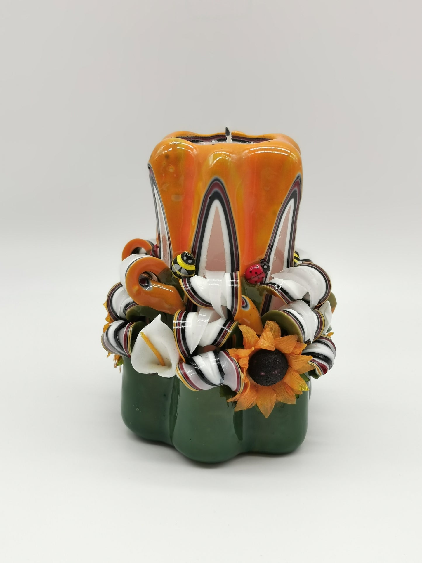 Carved candle "spring" green and orange